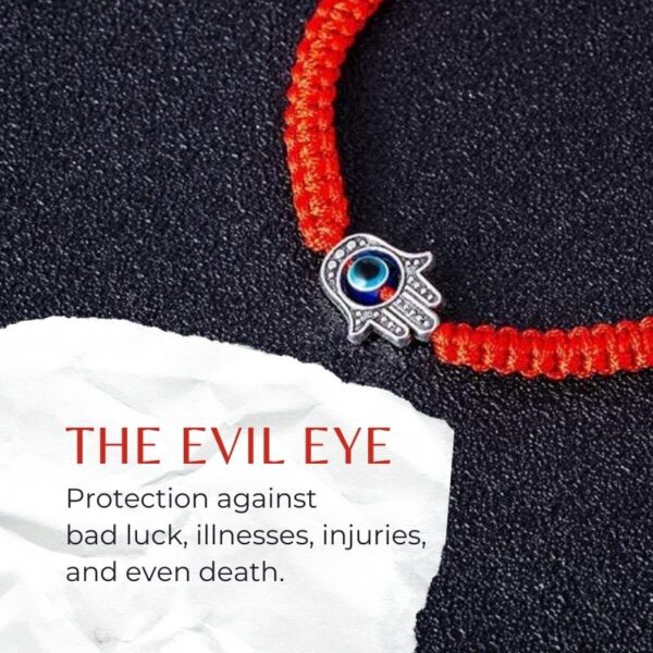 A vibrant red braided cord bracelet featuring an adjustable sliding knot closure and a silver-toned Hamsa hand charm with a central blue Evil Eye.