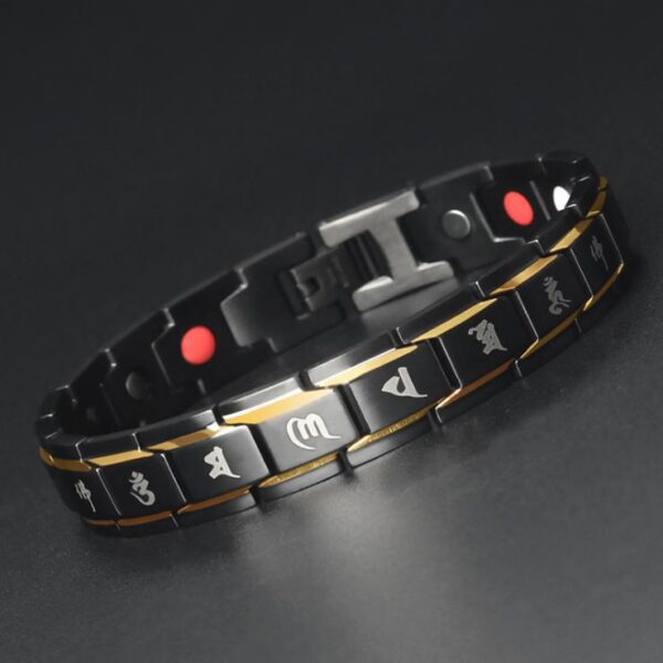 A robust black titanium link bracelet featuring gold inlays, red germanium dots, and sacred Tibetan mantra engravings.