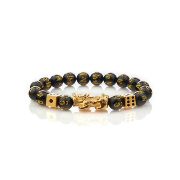 Features glossy black obsidian beads with gold mantras, centered by a golden Pixiu beast and flanked by gold dice charms.