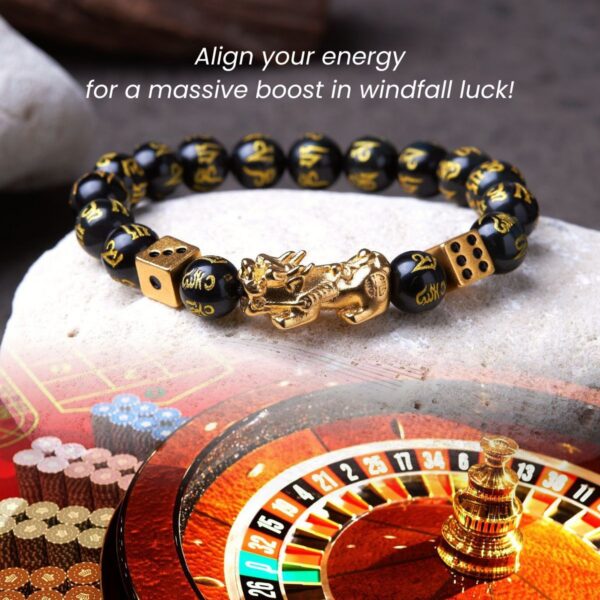 Features glossy black obsidian beads with gold mantras, centered by a golden Pixiu beast and flanked by gold dice charms.