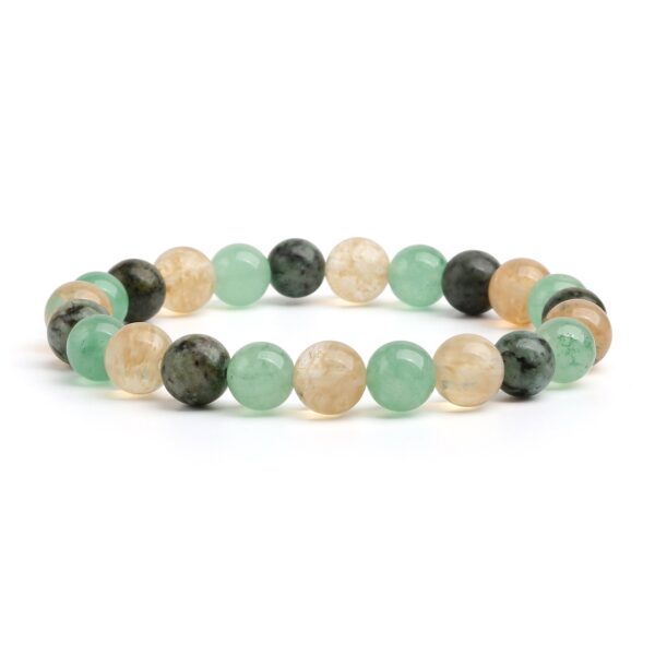 This beaded bracelet showcases an alternating pattern of polished golden citrine, light green aventurine, and speckled dark green turquoise stones.